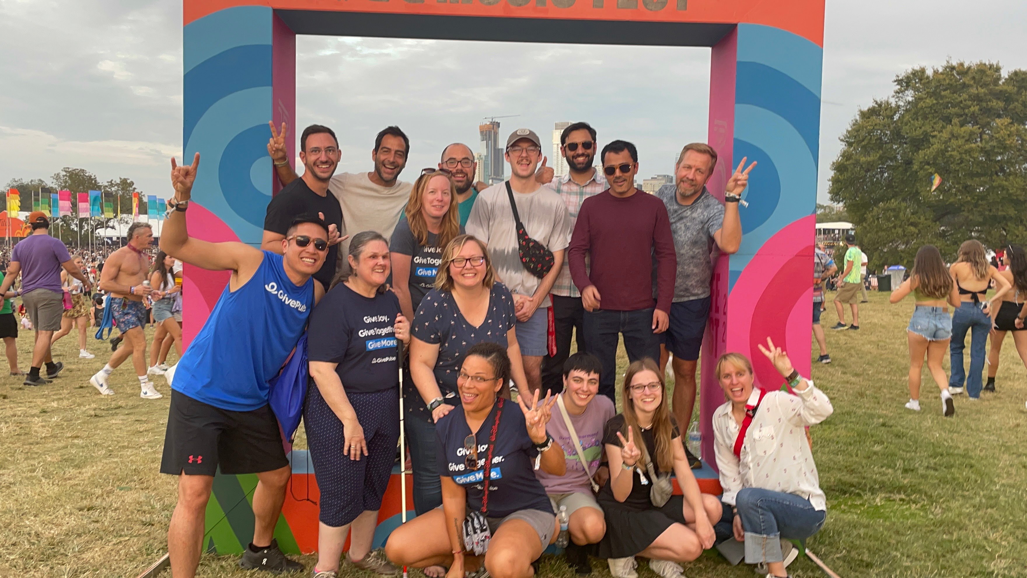 GivePulse team group picture having a great time at the Austin City Limits music festival where we got the chance to meet up with one of our clients, Austin Parks Foundation, responsible for coordinating volunteering during the festival