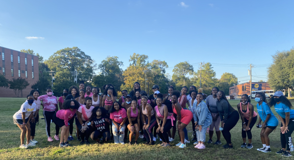 20 Black Girls Vote group members standing outside before an event to spread voter awareness and advocacy 