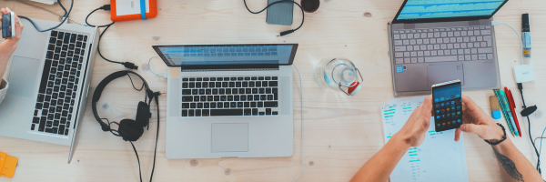 Nonprofit professionals desk with a computer 