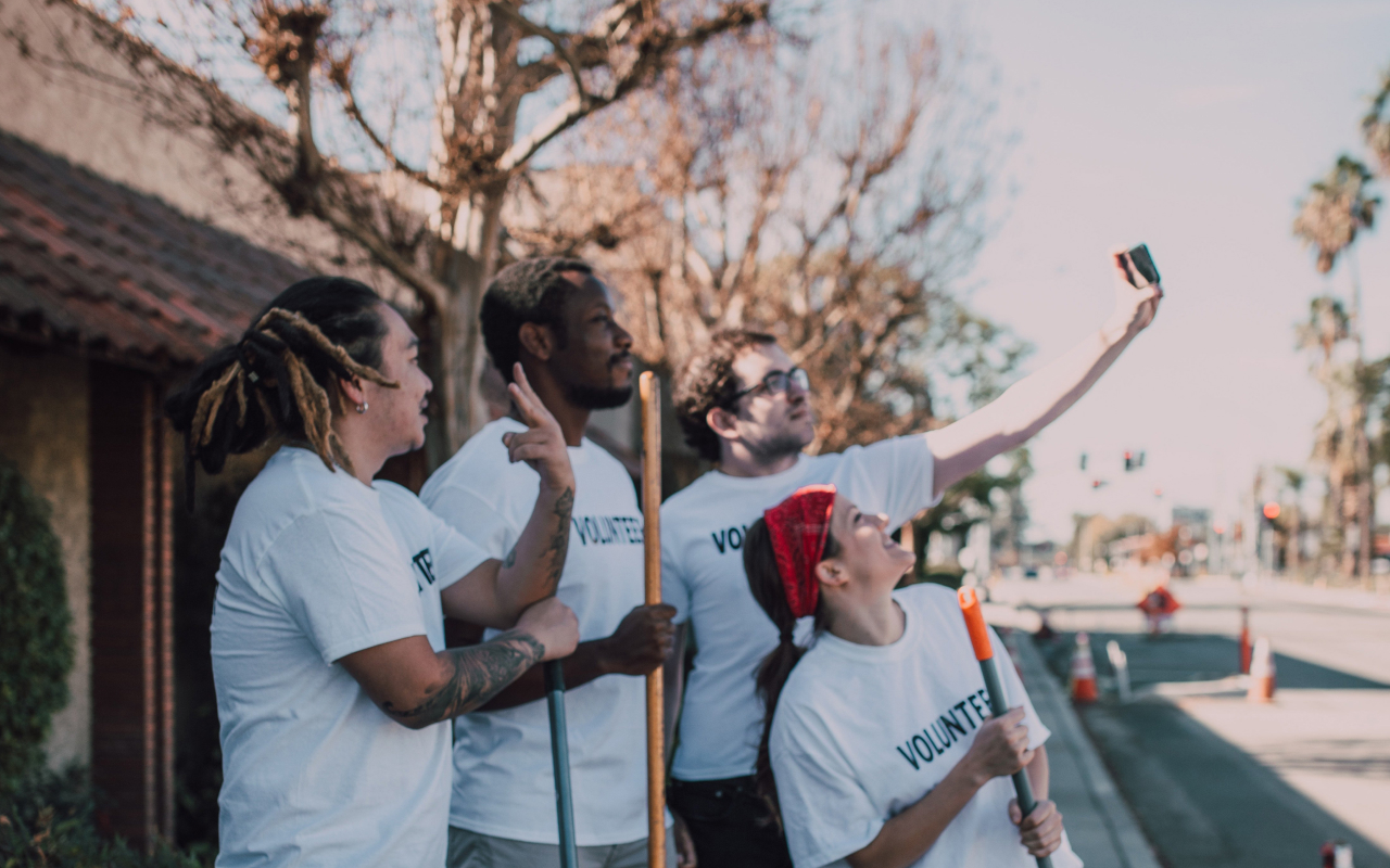 Volunteers taking a selfie to share in a GivePulse reflection