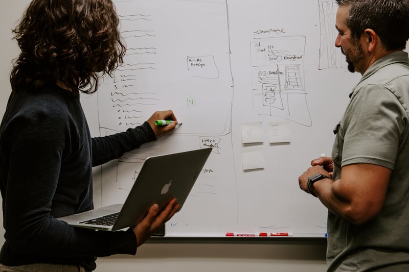 Professor and student working on a community engaged research project 