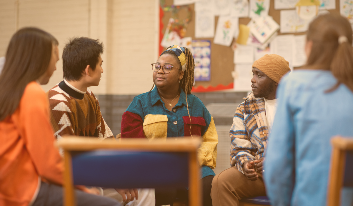 A group of conversing college students.